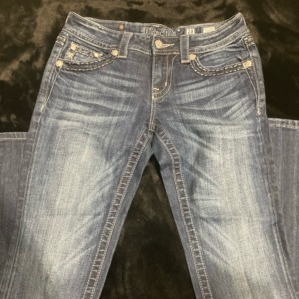 Size 28 miss me jeans .